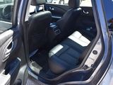 a car that has the door open and the seats down