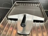 an image of a toaster on a stove in a kitchen