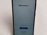 a close up of the back of a smartphone with a message on the screen
