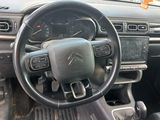 the interior of a car with a steering wheel, dashboard, and dash board