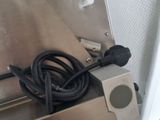 an image of a machine that has a cord attached to it