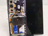 a picture of a cell phone with a broken screen