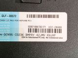 an image of a close up of a computer keyboard with a barcode on it