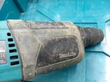 a drill that is sitting on top of a blue box
