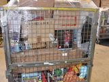 a large metal cart with a lot of food inside of it