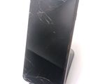 an image of a cell phone with a cracked screen