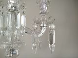 a crystal chandelier hanging from the ceiling