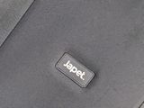 a close up of a piece of luggage with a label on it