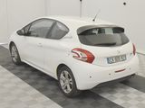 a picture of a white car parked in a garage