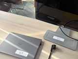 a laptop and a laptop computer on a desk