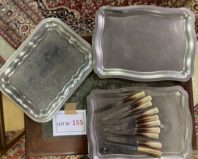 three trays of matches and a tray of matches on a table