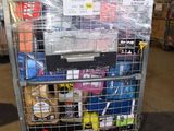 a metal cart with many items in it in a warehouse