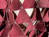 a close up of a dress made out of red material