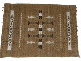 a brown rug with arrows and arrows on it