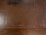 an image of a wooden floor with a brown patt