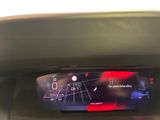 a digital display on the dashboard of a car