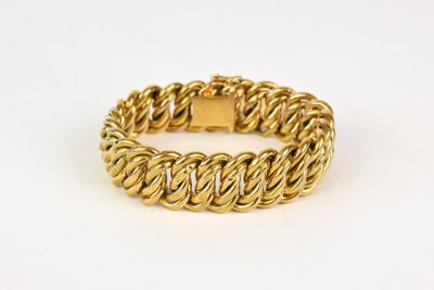 a gold chain bracelet with a square clasp on a white background
