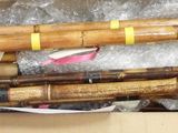 a box full of baseball bats sitting on a table