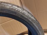 a close up of a tire with a box in the background