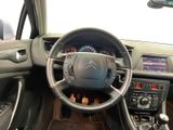 the interior of a car with a steering wheel, dashboard, and dash board
