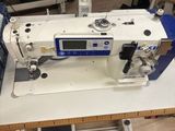 a sewing machine that is sitting on a table