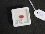 a small white box with a red ring inside of it