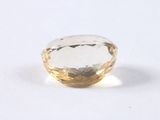 an image of a yellow and white diamond on a white surface