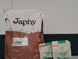 two bags of dog food and a bag of dog food on the floor