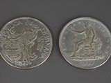 two silver coins with the image of a man on a horse and a woman on a horse