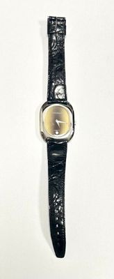 EMILE PEQUIGNET, montre de dame acier bracelet cuir