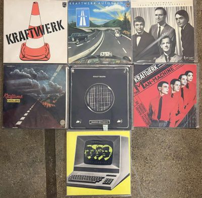 a lot of cd ' s that are on the floor