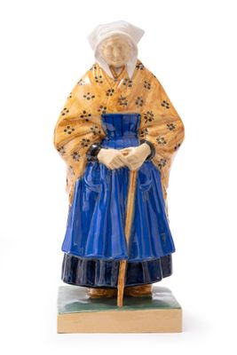 figurine of a woman in a blue dress and hat with a cane