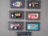 a lot of nintendo game cartridges on the table