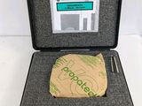 an open case with a piece of paper in it on a white surface