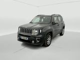 Une jeep noire est garée dans une pièce blanche