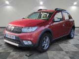 the red dacia is parked in a room with a checkered floor