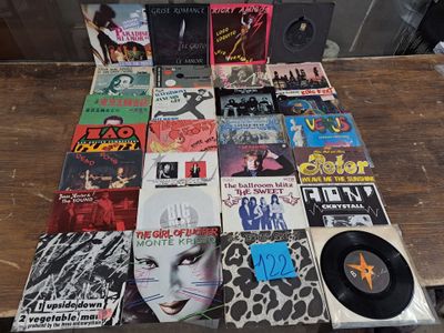 a lot of records on a table with a lot of them