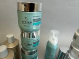 many different types of skin care products sitting on a table