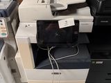 many different types of printers and scanners stacked on top of each other