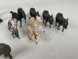a lot of figurines of animals that are on a table