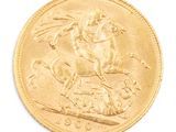 une image représentant une pièce d'or sur laquelle figurent un cheval et un cavalier
