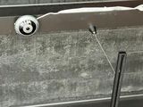 a close up of a metal door handle on a wall