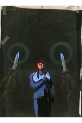 an image of a woman in a blue suit holding a pair of scissors