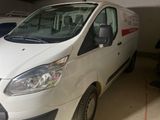 a white van that is parked in a garage