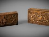 deux coffrets en bois sculptés, ornés de figures humaines