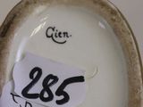 a close up of a cup with a price tag on it