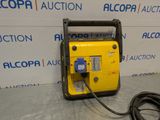 a yellow and black portable air compressor sitting on top of a table