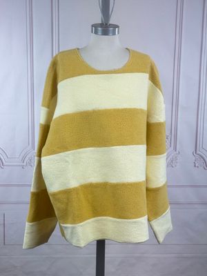 a yellow and white striped sweater on a mannequin mannequin mannequin mannequin mannequin mannequin mannequin mannequin