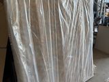 the mattress is wrapped up and ready to be shipped in the store