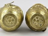 pair of antique chinese brass figurines of apples with asian writing